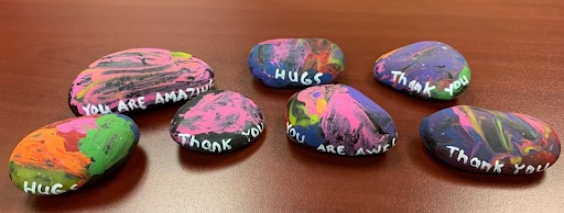 Some of their painted rocks with messages of kindness