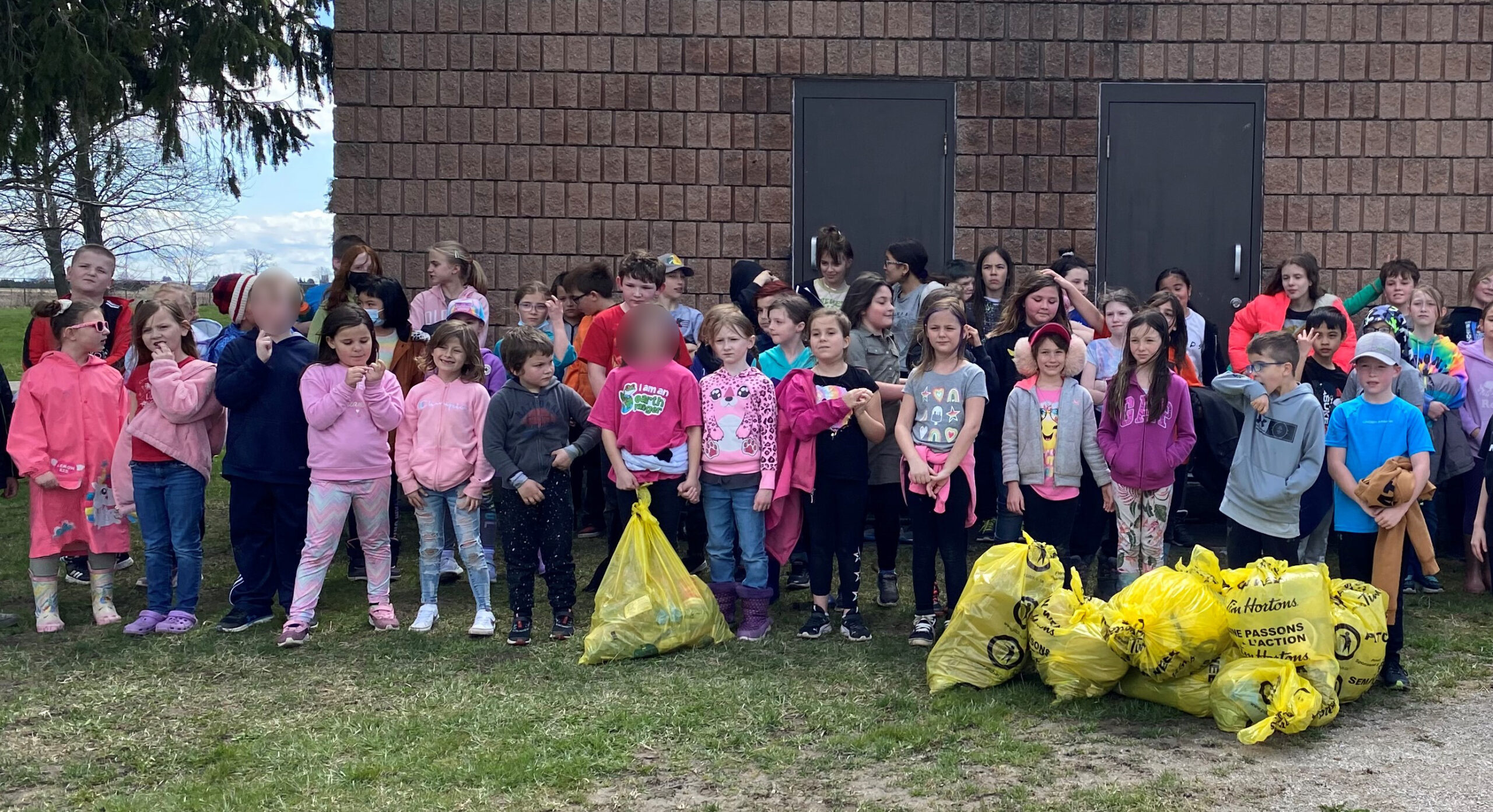 Holy Family Students ‘Pitch-In’ as Part of National Earth Month Activities